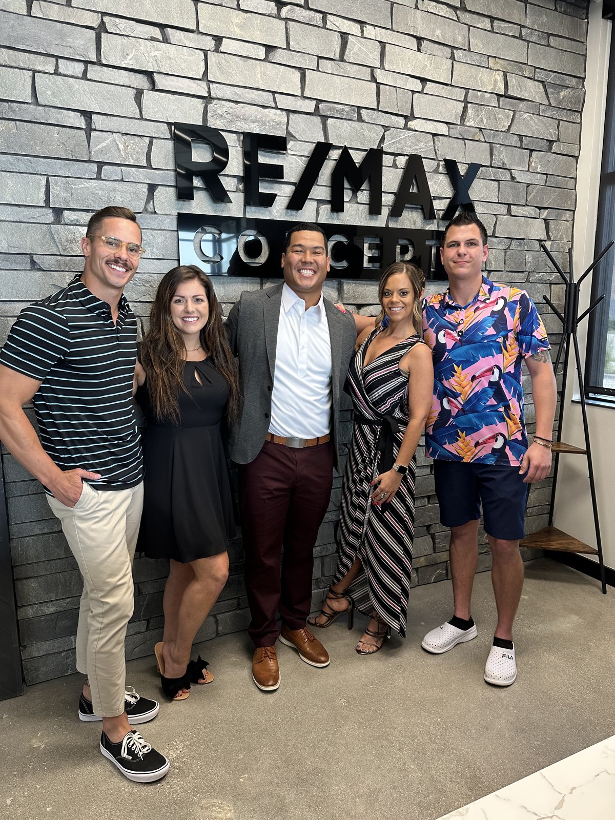 Allen Weaver with his team at the RE/MAX office